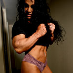 Second pic of Female bodybuilder Debbie Bramwell with outstanding muscle body strips down to her underwear