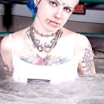 First pic of Naked alt girl Rachel Face lets you read her tattoos and shows her pierced parts in jacuzzi