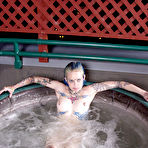 Fourth pic of Naked alt girl Rachel Face lets you read her tattoos and shows her pierced parts in jacuzzi