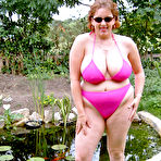 First pic of Brazen mature fatty Curvy Claire sheds bikini in the backyard to finger fuck - PornPics.com