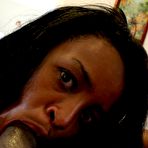 Fourth pic of Dark dominican girl Ashlei gets naked then sucks a cock