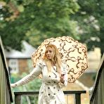 First pic of Sapphire of Busty Brits classy and sexy with a raincoat and umbrella