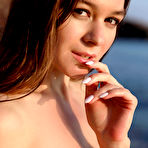 Fourth pic of Stefani posing nude on rocks while waves splash around her | Erotic Beauties