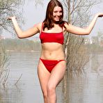 Second pic of Red Bikini Stripping Outdoors