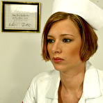 First pic of Doctor Katja gets dominated and dildoed by nurse Chanta Rose on the exam chair