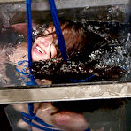 Fourth pic of Naked bondage girl Swiss gets tied tightly with ropes before dunking in a water tank