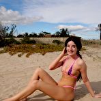 Fourth pic of BikiniFanatics - Perky peach booty micro bikini teen on the beach