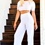 First pic of Blake Blossom removing her white shirt and pants on the stairs