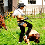 Second pic of Dominating cowgirl Gina Killmer trains and punishes her muscle ponyboy in the backyard