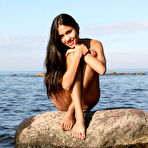 Fourth pic of Beautiful sporty brunette on rocky beach — Russian Sexy Girls