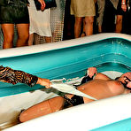Third pic of Oiled wrestling match between Kate Black and her opponent at the all-girl party