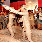 Second pic of Dionne Darling takes part in public mud wrestling at the all-girl party
