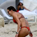 First pic of Katie Cassidy in red bikini on a beach
