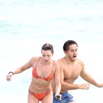 Third pic of Katie Cassidy in red bikini on a beach