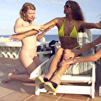 First pic of Lesbian domina Kym Wilde in bikini punishes naked Madison Young in the outdoors