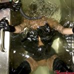 Third pic of Slave Lady Lou in mask has water bondage experience for the fun of kinky mistress Lady K