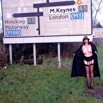 Fourth pic of British Milf Barby opening her long coat flashing  drivers as they pass by – Exhibitionist amateurs