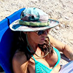 First pic of Sporty American milf Abby Marie loves flashing her big pussy lips on the beach