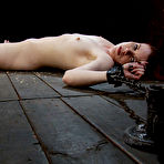 First pic of Tight red-haired slave girl Lilla Katt gets spreadeagled on the floor and tickled.