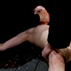 Third pic of Tight red-haired slave girl Lilla Katt gets spreadeagled on the floor and tickled.