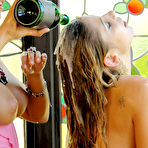 Fourth pic of Rachel Evans in golden dress and Hana Black in pink one pour wine on each others breasts