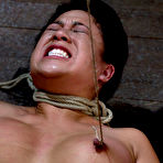 Second pic of Roped tied Kayme Kai gets her oriental shaved pussy and small nipples punished