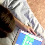 Fourth pic of 
					Teen girl is playing games on tab and being fucked / TeenPornTube.XXX
			