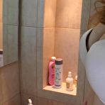 Second pic of Brunette girlfriend trying high heels in the bathroom - AmateurPorn