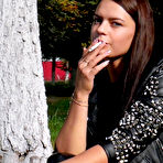 First pic of Russian Smokers | Pretty faced Asya is smoking a cigarette outdoors