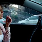 Third pic of Russian Smokers | Meet Anastasia in her car while she is smoking two 120mm all white cigarettes