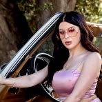 First pic of Renee Olstead displays her big boobs and curvy figure around the car