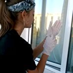 First pic of Gorgeous girl showing her nice ass while cleaning the window 15 photos