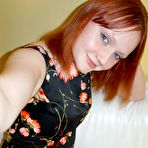 First pic of Pretty redhead babe knows how to tease at HomeMoviesTube.com
