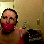 Second pic of tied-and-gagged.com | 26 YEAR OLD ACTRESS IS F0RCED TO STUFF SMELLY PANTIES IN HER MOUTH, WRAP BONDAGE TAPE GAGGED, HANDGAGGED, GAG TALKING AND HOG-TIED ON THE BED (D75-8)