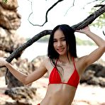 First pic of Mayuko showcases her enticing wet and thin body on the beach