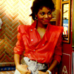 Third pic of Young Janet Jackson posing sexy and braless