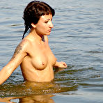 Third pic of Pretty ladies totally nude at the nude beach