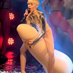 Fourth pic of Miley Cyrus simulate oral sex with the sex doll