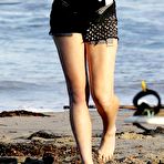 Third pic of Lindsay Lohan shows cleavage in black bikini in Malibu