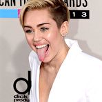 First pic of Miley Cyrus no bra under white jacket at AMA 2013