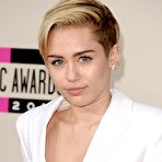 Fourth pic of Miley Cyrus no bra under white jacket at AMA 2013