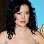 Third pic of Busty Jennifer Tilly deep cleavage and areola slip