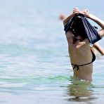 First pic of Anne Hathaway in black bikini on the beach candids