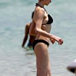 Third pic of Anne Hathaway in black bikini on the beach candids