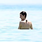 Fourth pic of Anne Hathaway in black bikini on the beach candids