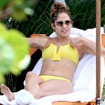 First pic of Jennifer Lopez in yellow bikini poolside shots