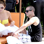 Third pic of Jennifer Lopez in yellow bikini poolside shots