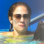 Fourth pic of Jennifer Lopez in yellow bikini poolside shots