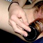 Fourth pic of Photo gallery of an amateur wild hottie fucking her cunt with a bottle