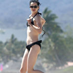 Fourth pic of Krysten Ritter in black bikini on a beach